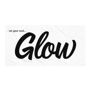 glow beach towel flat lay