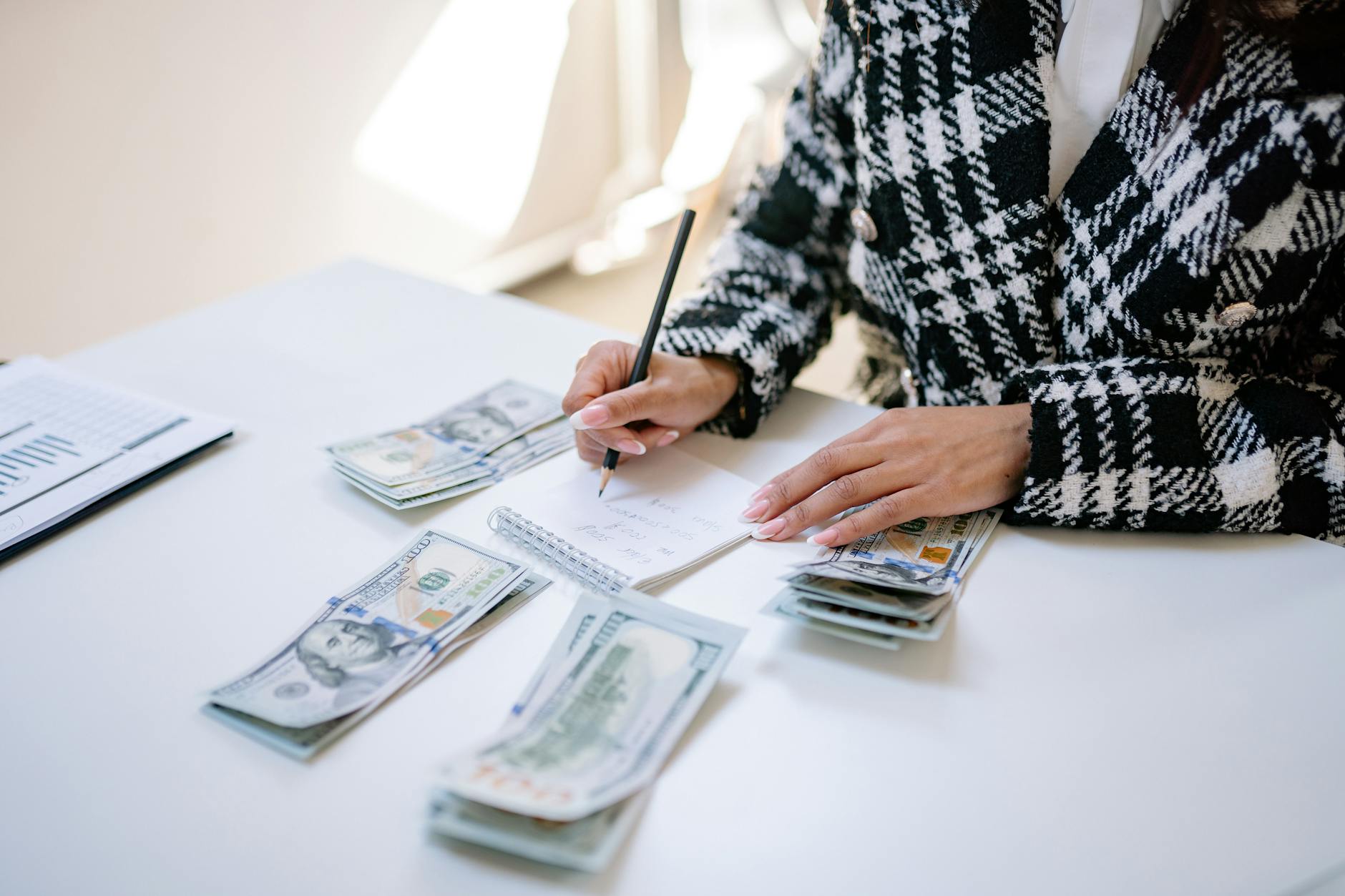 woman hands counting dollars