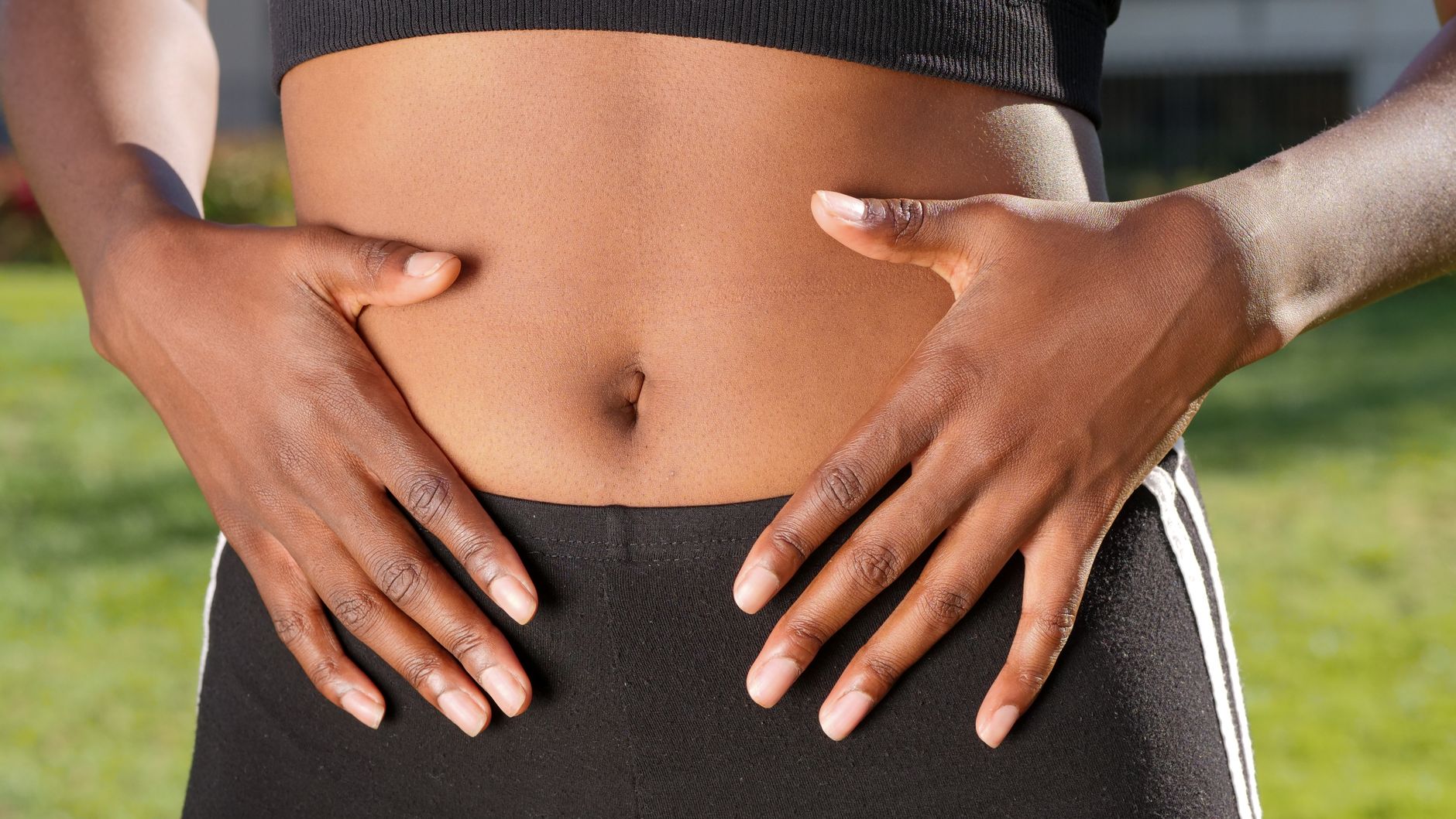 pexels-photo-7298670 a person touching her belly